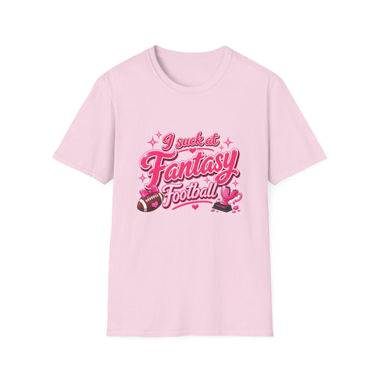 Light Pink Gildan 64000 Softstyle t-shirt with a glossy pink script print reading I suck at Fantasy Football across the chest, with hearts, a football tied with a pink bow, and a shattered pink trophy.